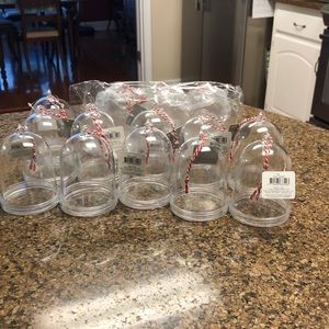 Fourteen Snowglobe fillable plastic ornaments